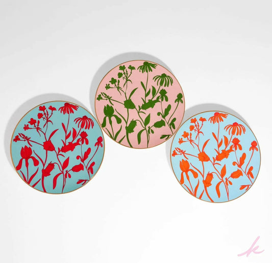 Complete Love Triangle Set of 6 dinner plates, featuring bold geometric designs in green, pink, blue, orange, and red, perfect for a modern, vibrant table setting.