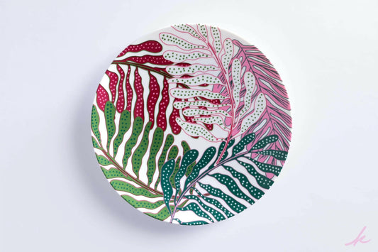 Leopard dinner plate, adorned with striking illustrations of detailed leaves, creating a harmonious blend of nature and wildlife