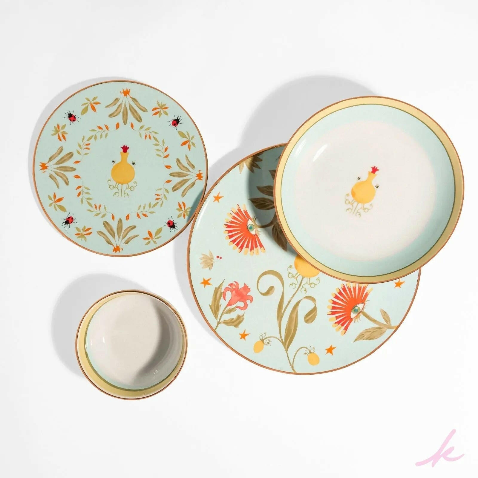 Complete Peek-a-Bloom Set, featuring delicate plates, bowls, and cups adorned with playful, twinkling blooms that come alive with joyful moments around the table.